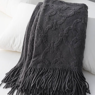 Cobertor elegante com franjas texturizadas