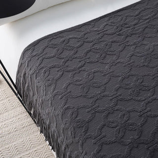 Cobertor elegante com franjas texturizadas