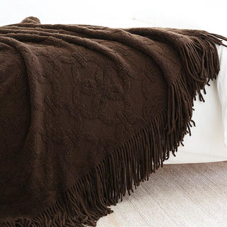 Cobertor elegante com franjas texturizadas