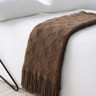Cobertor elegante com franjas texturizadas
